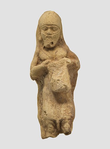 Figurine plaque: bearded man playing a drum
