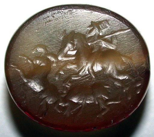 Stamp seal and modern impression: hunter on horse attacking rams