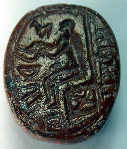 Stamp seal (ovoid) with deity (?)