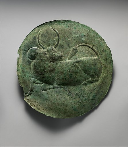 Plate with reclining zebu