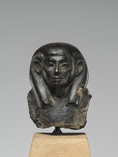 Head and chest of a shabti figure