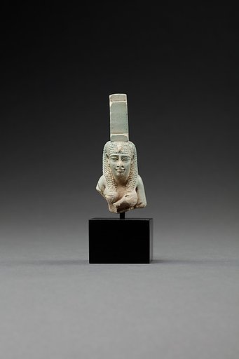 Upper part of a figure of Isis nursing Horus