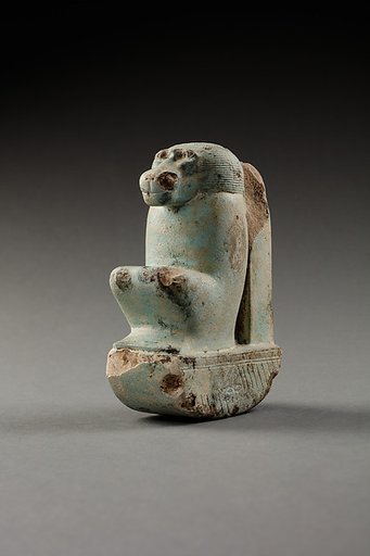 Figure of baboon on a basket and with a pillar, the shebet offering