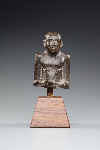 Upper Part of a Seated Figure in a Long Kilt