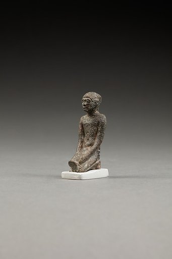 Kneeling Priest, Pouring Libation