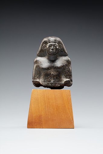 Upper part of a figure of a seated official