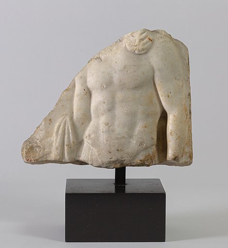 Marble relief fragment with male torso