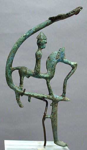 Bronze leg of a cauldron with horseman