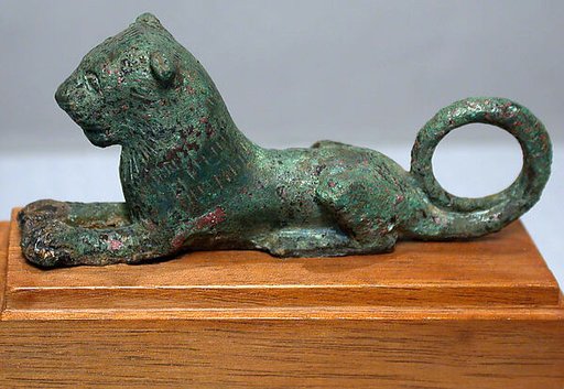 Bronze figure of a recumbent lion