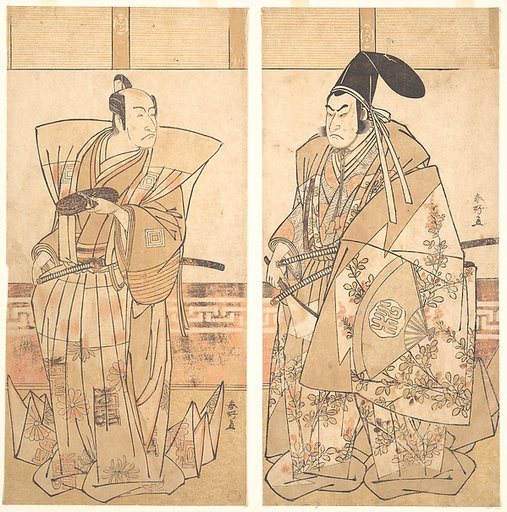 Two Actors Dressed in Ceremonial Costumes