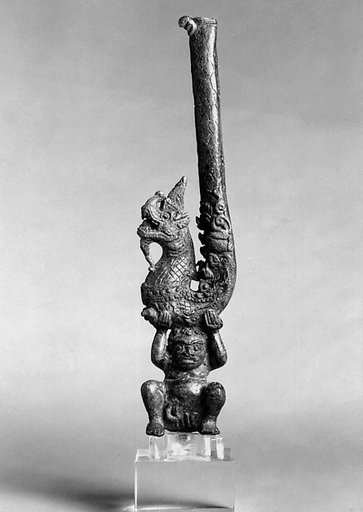 Yaksha Supporting a Naga