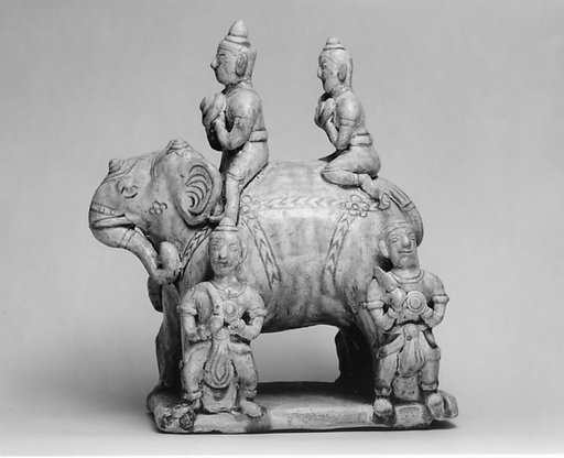 Elephant with Two Riders and Four Grooms