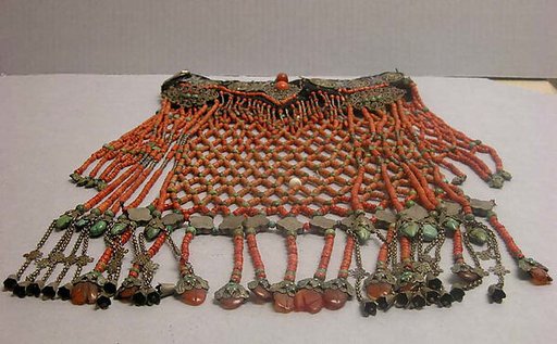 Headdress that hangs over face