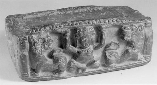 Pedestal with Yaksha and Two Lions