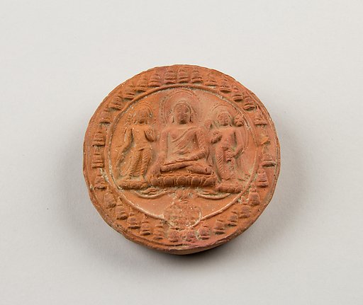 Molded Plaque with Seated Buddha and Attendant Bodhisattvas