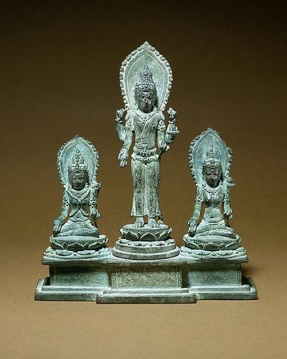 Standing Four-Armed Avalokiteshvara Flanked by Tara and Bhrikuti(?)