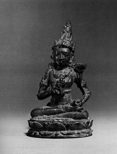 Seated Deity Holding a Double Vajra