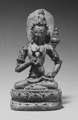 Seated Male Deity Holding a Double Vajra