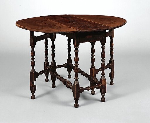 Oval table with falling leaves