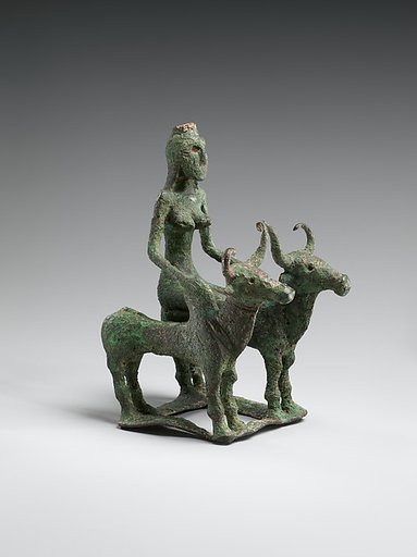 Woman Riding Two Brahman Bulls