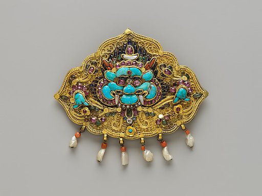 Woman’s Brooch with Monster Mask