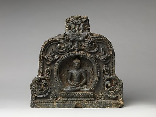 Meditating Buddha with Alms Bowl Enthroned in a Foliated Niche