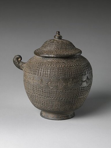Covered urn with geometric decoration