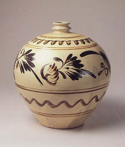 Bottle with abstract flowers and leaves