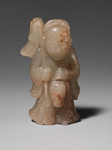 Boy Riding a Hobby Horse