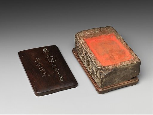 Ink palette carved from an ancient brick