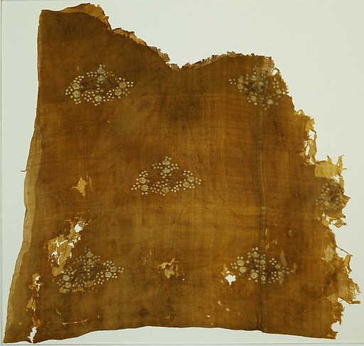 Textile fragment with birds among flowers