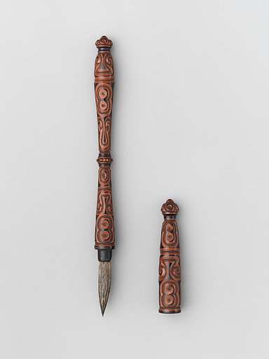 Writing brush with geometric patterns