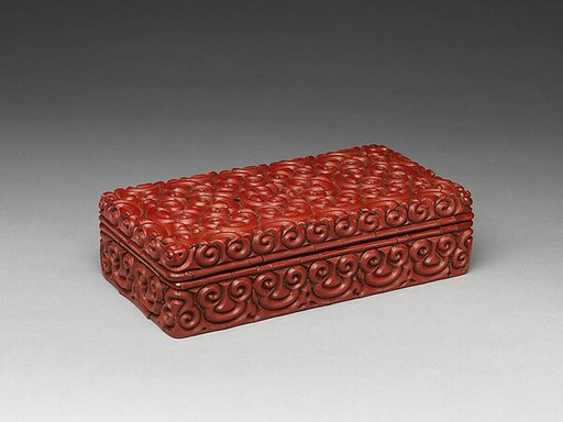 Rectangular box with pommel scrolls