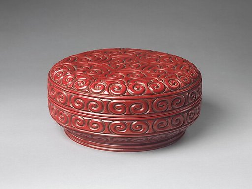 Box with pommel scroll design