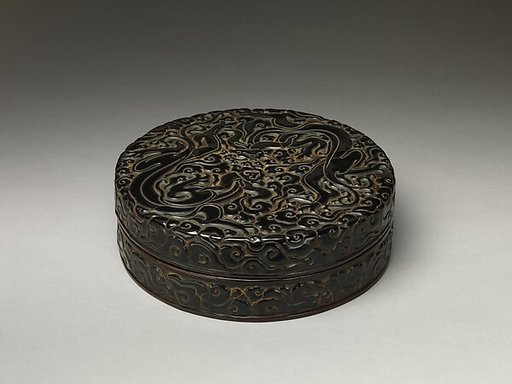 Box with chi dragons amid clouds