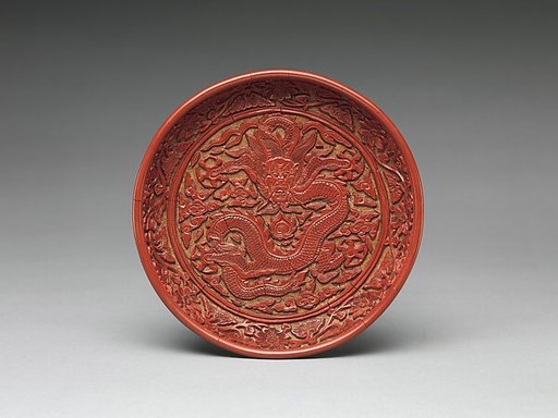 Dish with a dragon amid clouds