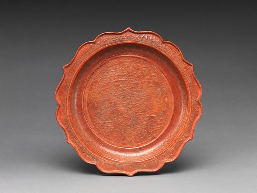 Pedestaled dish with scalloped rim