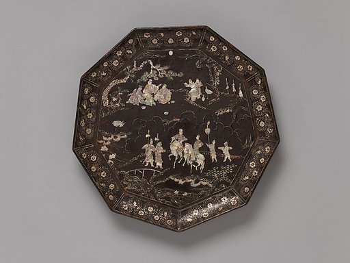 Tray with figures in a landscape