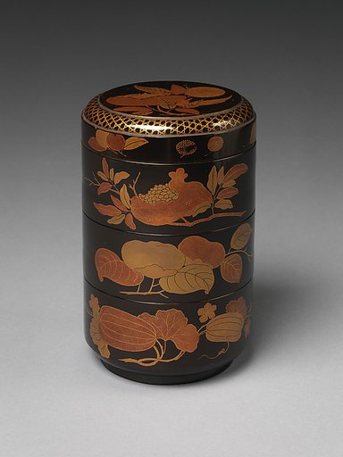 Cylindrical Stack of Food Boxes with Decoration of Autumn Fruits
