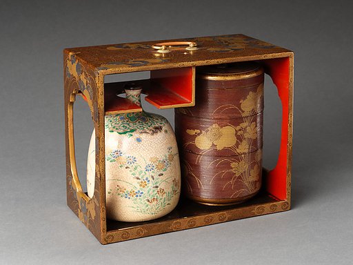 Picnic set with decoration of chrysanthemum and autumn grasses
