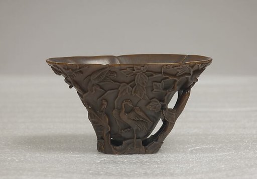 Cup with a Flower and Bird Scene