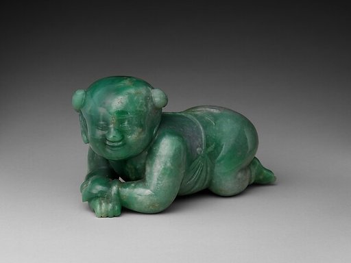 Pillow in the shape of an infant boy