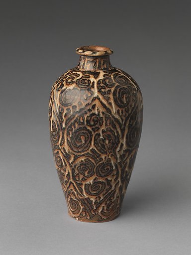 Bottle with cloud scrolls