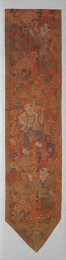 Vertical pendant with boys holding a lotus scroll