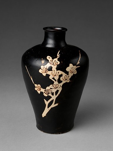 Vase with flowering plum