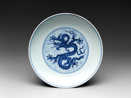 Dish with dragon amid waves