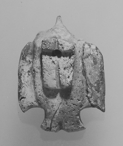 Plaque in the shape of a bird
