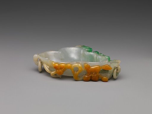 Dish with grapes and squirrels