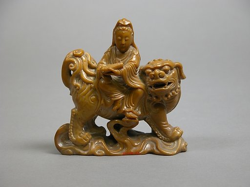 Manjusri riding a lion