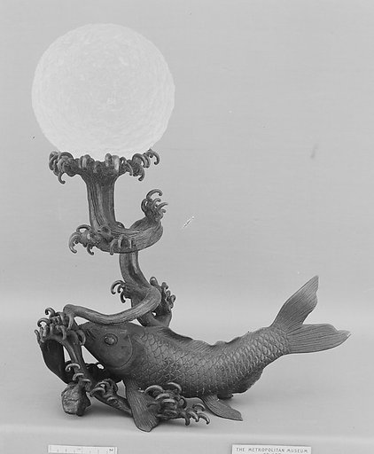 Crystal Ball on a Bronze Stand in the Shape of a Fish